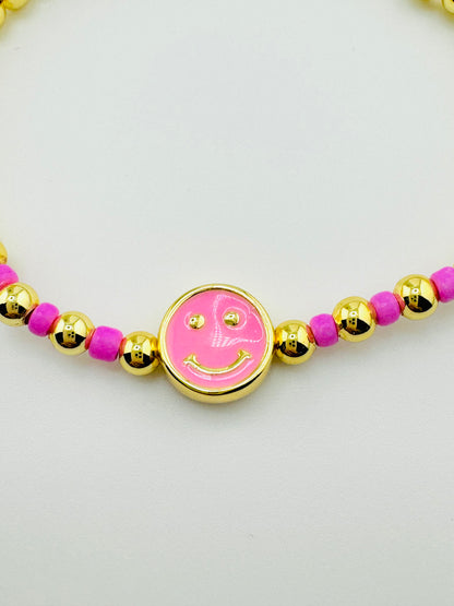 Delilah pink happy face in 18k gold filled bracelet