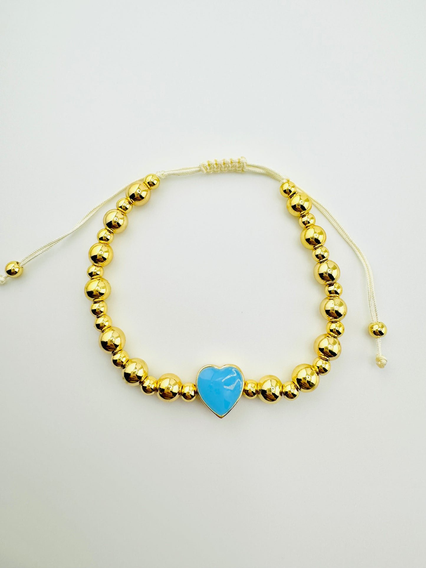 Samantha 18k gold filled bracelet with a blue enamel heart