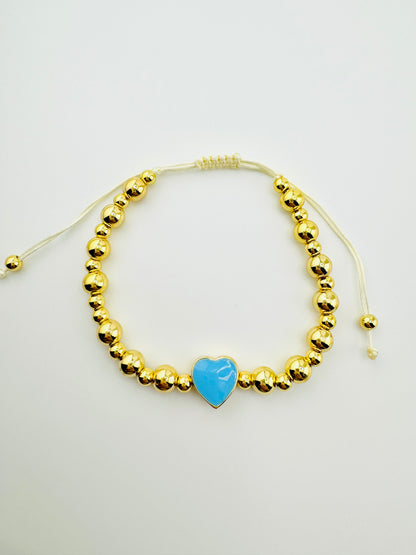 Samantha 18k gold filled bracelet with a blue enamel heart