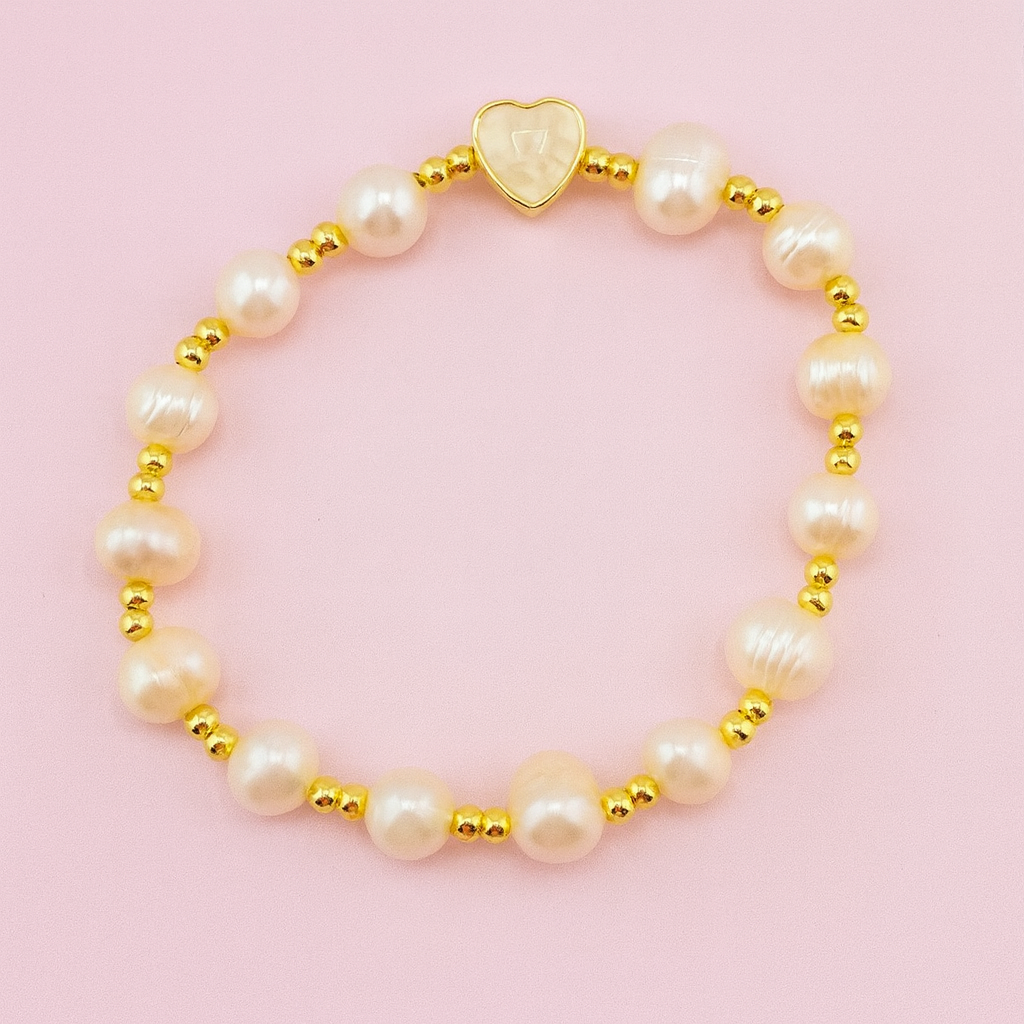 Jennifer freshwater pearl heart bracelet with gold-filled beads on pink background