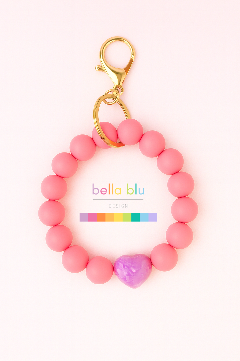 bubblegum pink wristlet keychain with a coquette bow heart