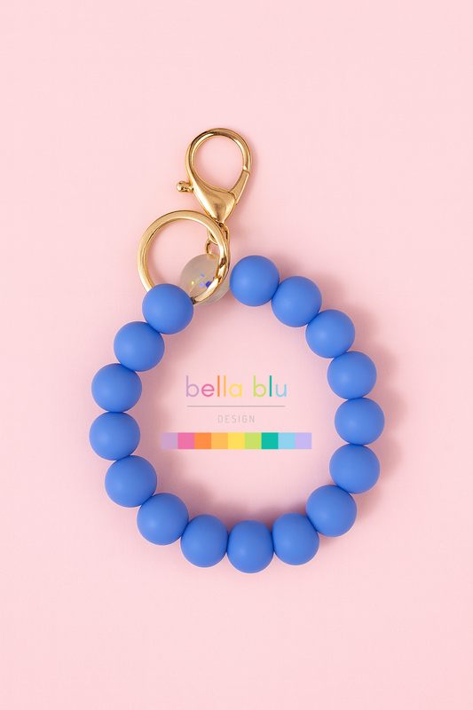 Periwinkle and gołd wristlet keychain
