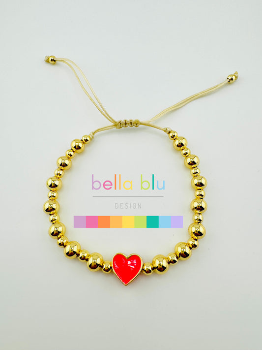 Samantha gold filled bracelet with a hot pink heart